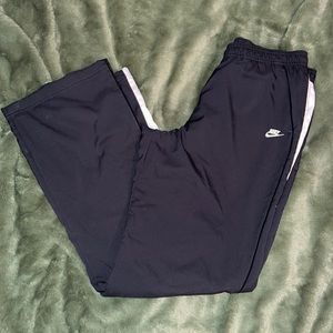 Nike fitdry straight leg pants, black with white stripes down the sides, size S
